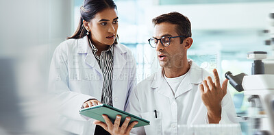 Buy stock photo Talking, science or people in lab with tablet, microscope or medical experiment for cancer treatment. Advice, scientist or teamwork with report, test results or sample with research, dna or bacteria