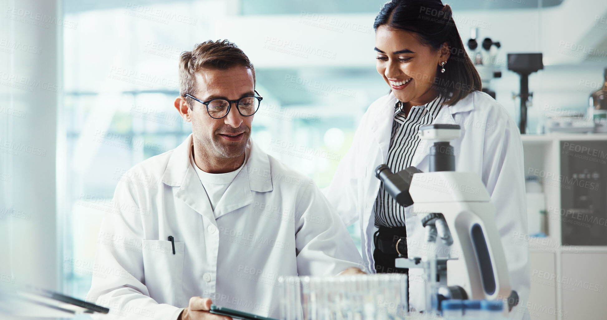 Buy stock photo Results, biotech or people in lab with tablet, microscope or medical experiment for cancer treatment. Smile, scientist or teamwork with science report, test or sample with dna, particles or bacteria