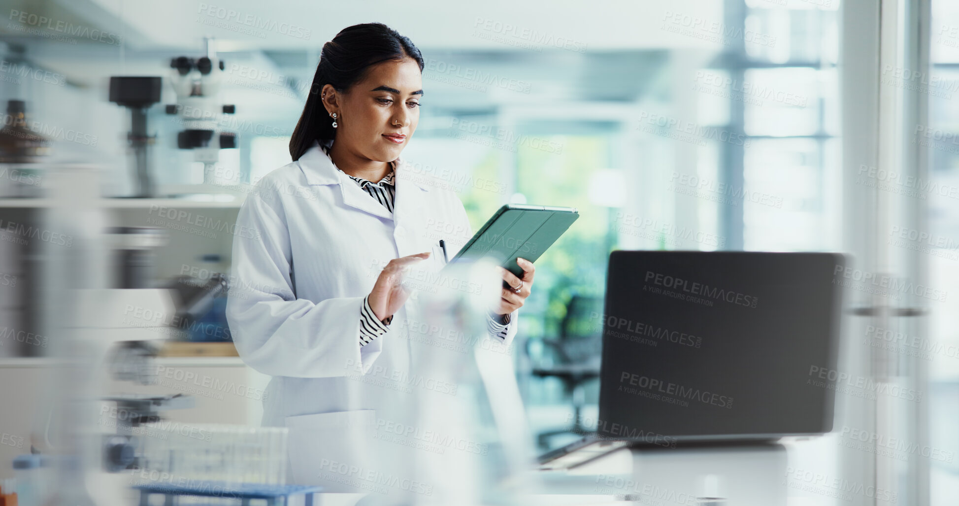Buy stock photo Tablet, woman and scientist in laboratory for research on healthcare innovation with biomedical engineering. Science, blur and female chemist working on technology for medical pharmaceuticals