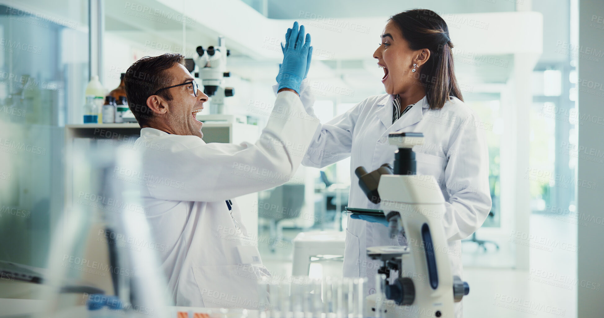 Buy stock photo Scientist, woman and man and high five for chemistry testing, excited and medical research. Pathology, laboratory and assistant with success for discovery or biotech experiment for breakthrough