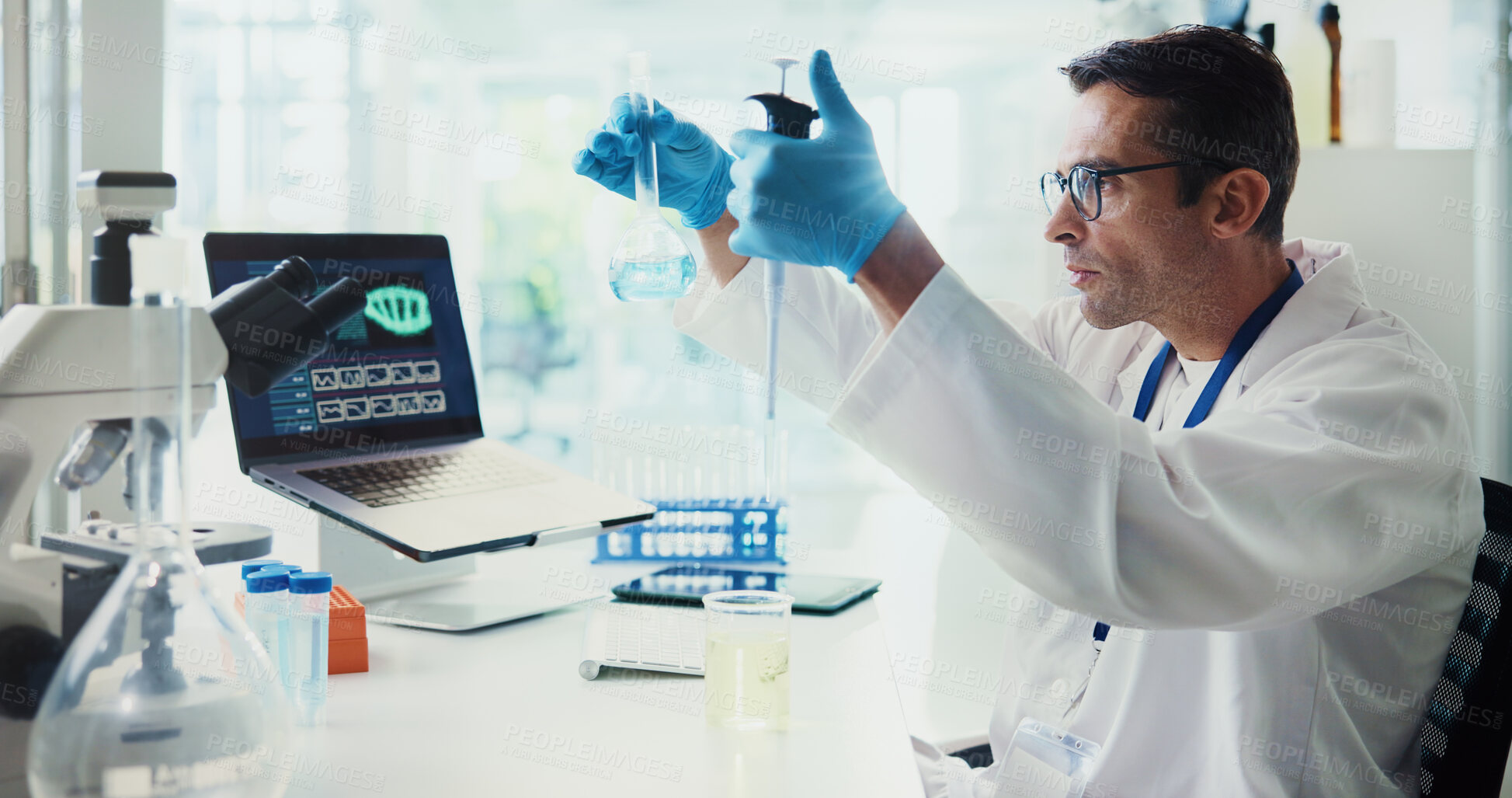 Buy stock photo Scientist, man and dropper in lab with dna, medical research and analysis for gene editing trial. Person, test and container with liquid, study and laptop for charts, progress and results with sample