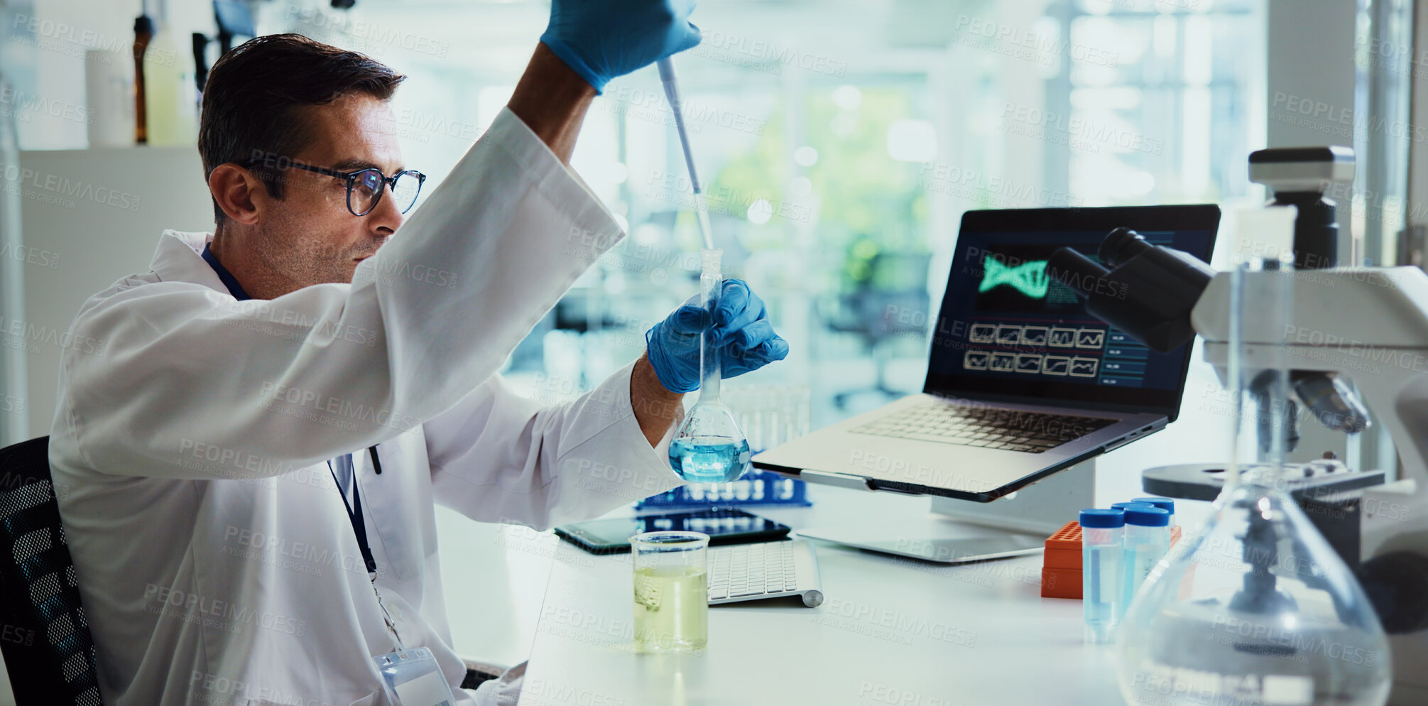 Buy stock photo Scientist, man and test tube for dna, study and medical research or analysis for gene editing trial. Person, process and glass container for chemical, laptop and charts with liquid sample for results