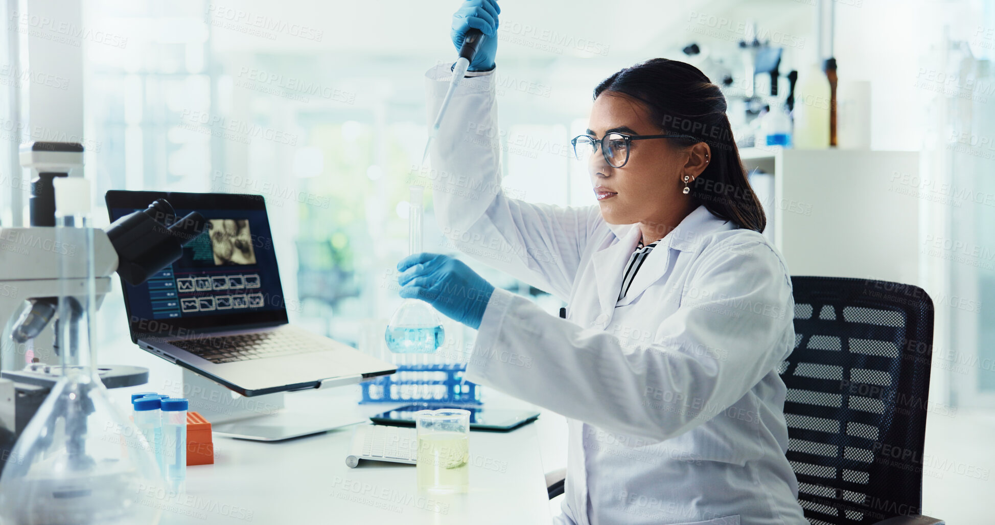 Buy stock photo Scientist, woman and study with dropper for chemistry, testing or medical research at laptop. Biotech, lab or analysis with data inspection for pharmaceutical or pathology experiment for breakthrough