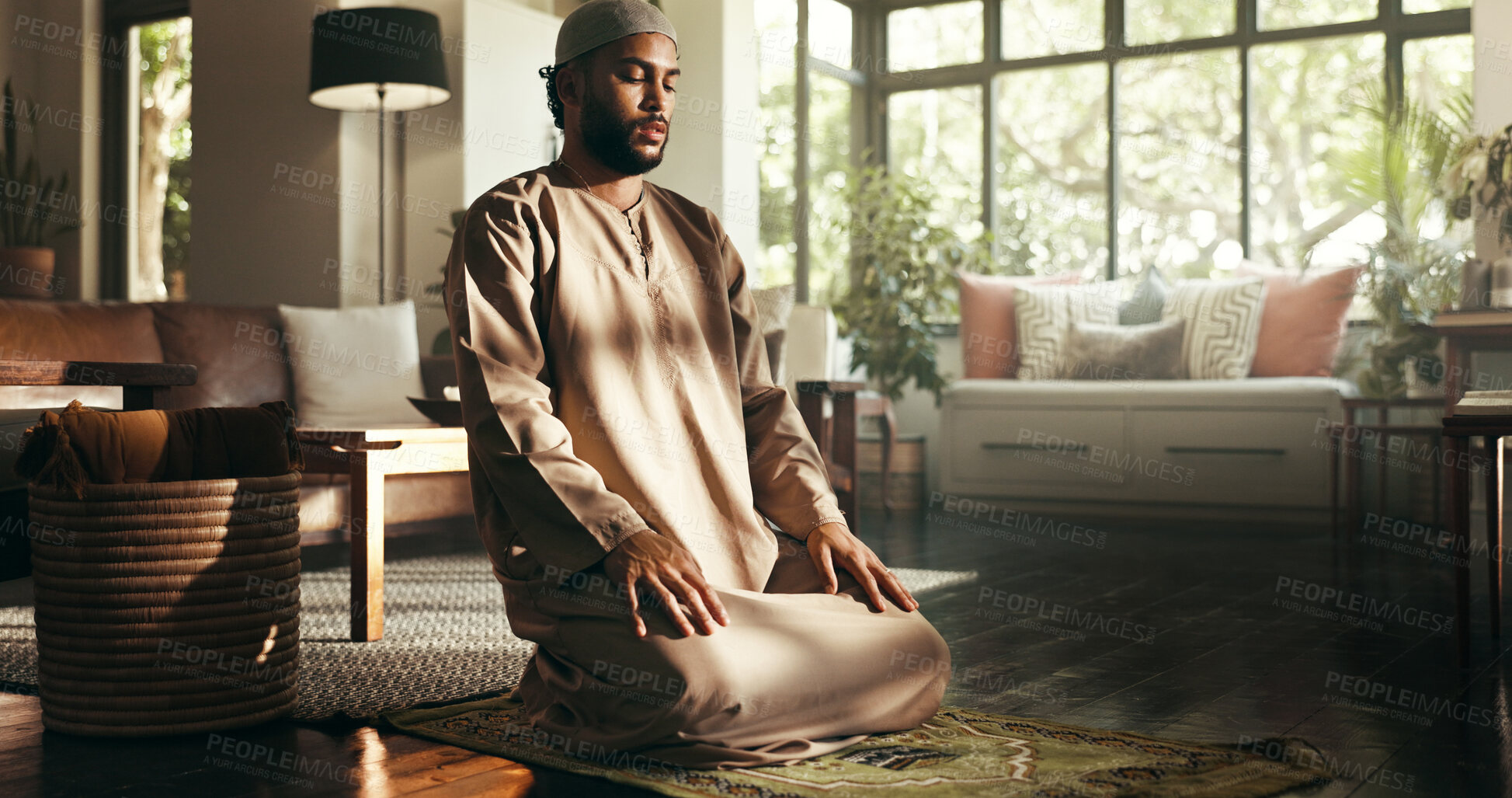 Buy stock photo Islam, worship and faith with man at home for ramadan kareem, spiritual and prayer. Floor, religion and eid Mubarak with Muslim person and salah in living room for gratitude, Allah praise and dua