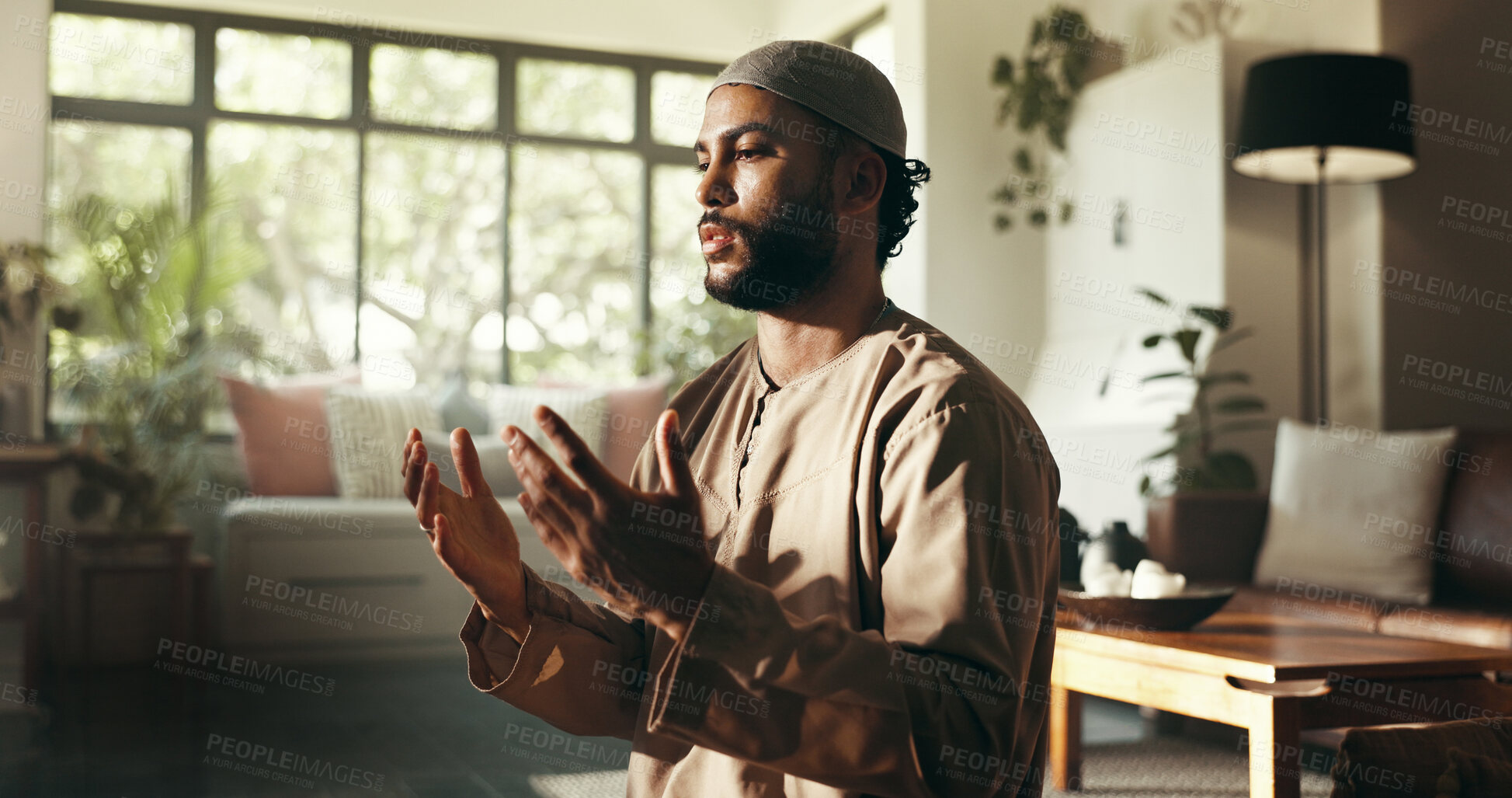 Buy stock photo Islamic, faith and man with prayer in home for spiritual worship, holy reflection and fasting meditation on floor. Muslim, person and dua in lounge for religious blessing, Ramadan and praise to Allah