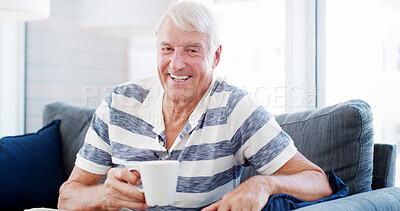 Buy stock photo Home, portrait and old man with coffee laughing to relax on comfortable sofa for resting break. Smile, happy or elderly person drinking caffeine beverage for peace, retirement or energy in England