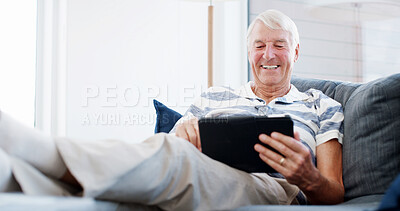 Buy stock photo Sofa, senior man and laugh with tablet for online game, web surfing and reading ebook at home. House, elderly person and relax on couch with digital poker, social media and connection in retirement