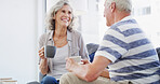 Bonding, relax and senior couple with coffee, home and romance for relationship in living room. Happy, old man and woman with tea, retirement and elderly people in lounge, conversation or marriage