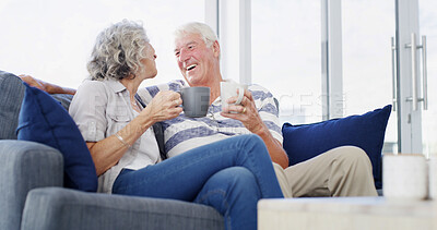 Buy stock photo Retirement, love and senior couple with coffee, home and bonding for relationship in living room. Conversation, old man and woman with tea, comfortable and elderly people in lounge, romance and relax