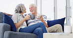 Retirement, love and senior couple with coffee, home and bonding for relationship in living room. Conversation, old man and woman with tea, comfortable and elderly people in lounge, romance and relax