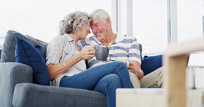 Buy stock photo Home, love and old couple on sofa, coffee and bonding together in living room. Mature people, man and woman on couch, herbal tea and romance with relationship, happiness and marriage with trust
