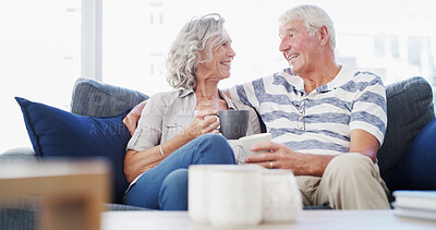 Buy stock photo Retirement, relax and senior couple with coffee, home and bonding for relationship in living room. Conversation, old man and woman with tea, comfortable and elderly people in lounge, romance and love