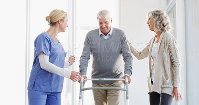 Buy stock photo Nurse, wife or old man with walker, support or love for healthcare, advice or help in hospital. Senior people, clinic or elderly couple with caregiver for assisted living or patient with disability