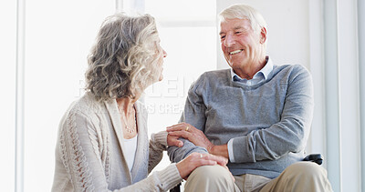 Buy stock photo Holding hands, wheelchair and senior couple in home for bonding, empathy and support. Retirement, marriage and happy mature man and woman together for compassion, care and loving relationship