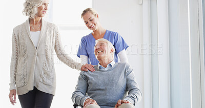Buy stock photo Wheelchair, home and senior couple with nurse, support and wellness with smile, healthcare and conversation. Caregiver, mature woman and old man with disability, happiness and love with retirement
