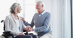 Holding hands, support and senior couple in home for bonding, empathy and trust in wheelchair. Retirement, marriage and happy mature man and woman together for compassion, care or loving relationship