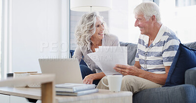 Buy stock photo Sofa, senior couple and documents with laptop for financial management, laughing and retirement plan. Home, man and woman with digital for review, online savings or investment with paperwork in house