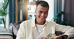 Home, laugh and man with smartphone for chat, online communication and text on dating website. House, male person and reading with mobile for application, message and meme on social media in lounge
