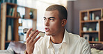 Speaker, voice note and man with phone in home for communication, talking and chatting on call. Online, mobile app and person on smartphone for connection, communication and contact in living room