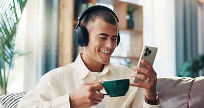 Buy stock photo Sofa, man and coffee with mobile for music, wellness and comfortable at home in morning. House, happy person and relax with headphones for listening sound, espresso and smartphone app for audio track