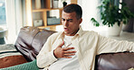 Home, man and sick with chest pain for cough, asthma and infection virus in living room on sofa. House, male person and respiratory illness on couch for pneumonia, tuberculosis and bacteria with flu