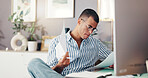 Man, documents and computer in home with finance, planning and review debt for bills, budget or payment. Person, paperwork and check statement for balance, investment or saving with tax compliance