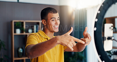 Buy stock photo Man, influencer and social network with ring light in home for live stream, video or post with emoji. Person, selfie and happy with icon for chat, audience or mobile app for content creation in house