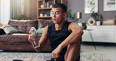 Buy stock photo Man, exercise and tired on floor, water bottle and rest in home with fitness, health or burnout in living room. Person, break and exhausted with workout, training or liquid for hydration at apartment