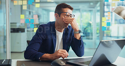 Buy stock photo Business, man and laptop with eye strain headache for news publication deadline, article pressure and brain fog. Creative agency, journalist and glasses with migraine for burnout, overworked or tired