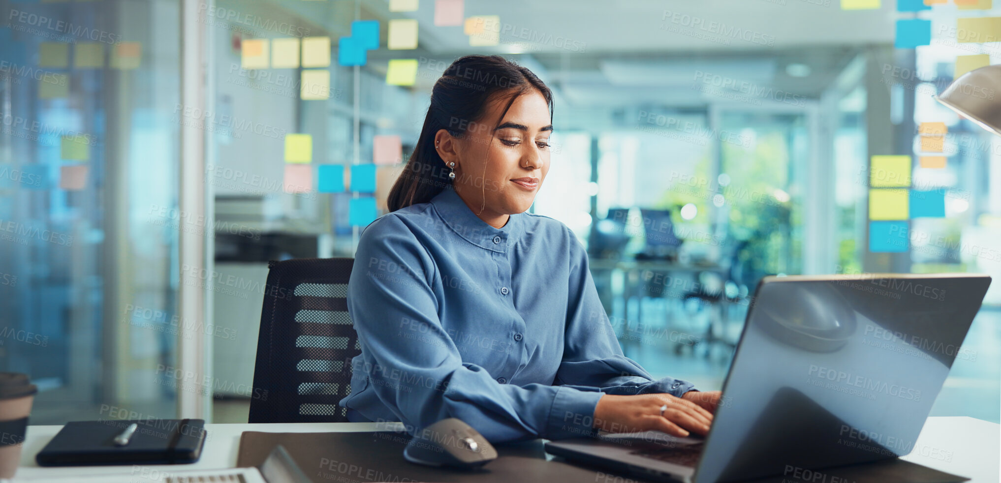 Buy stock photo Business, woman and typing on laptop at creative agency for news story, article research and proofreading blog. Project, journalist or happy in office for web publication, feedback review or planning