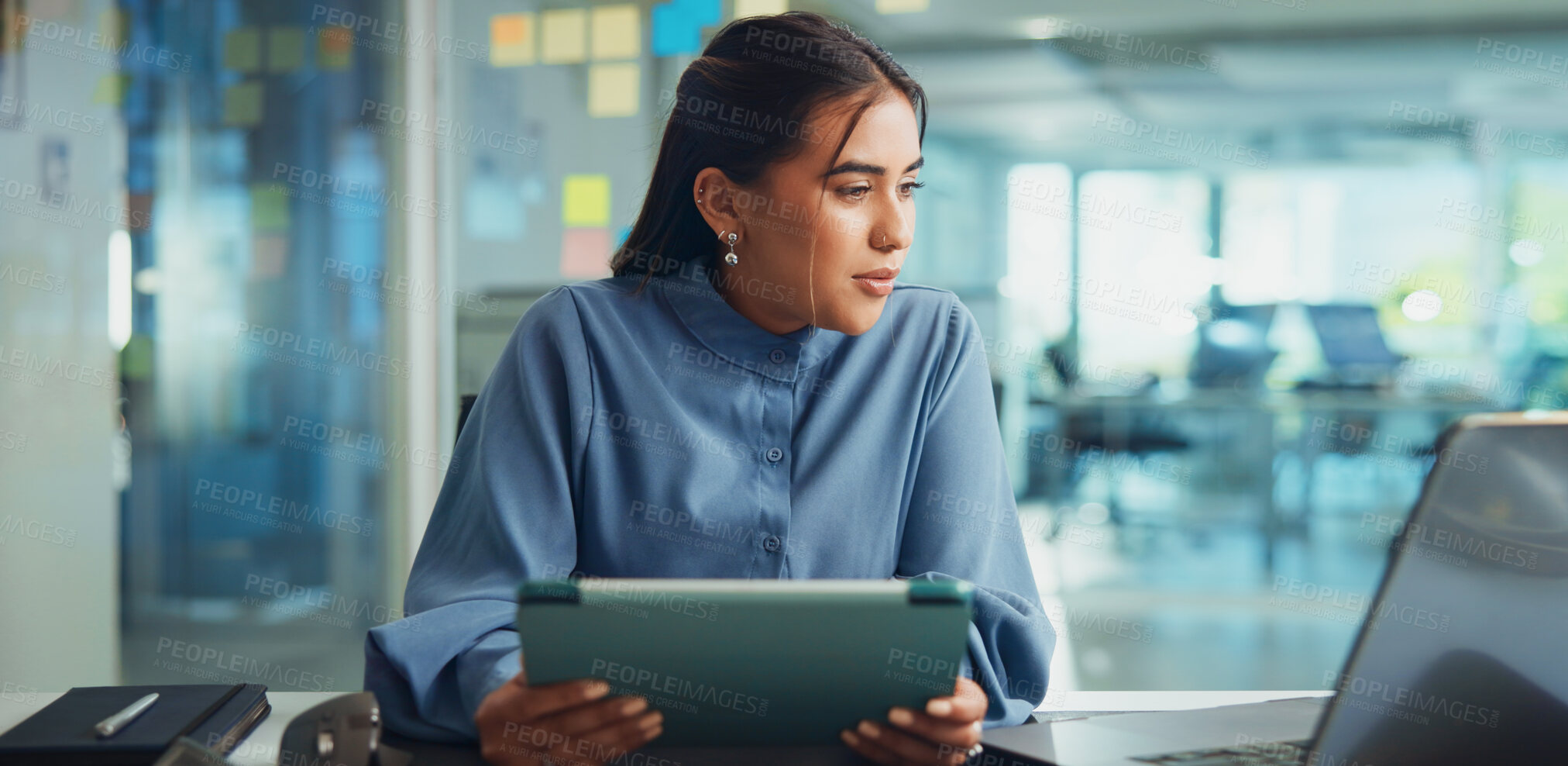 Buy stock photo Office, businesswoman and tablet with laptop for reading, article info and research for news story. Career, female person and journalist from creative agency with digital, editing or website for blog