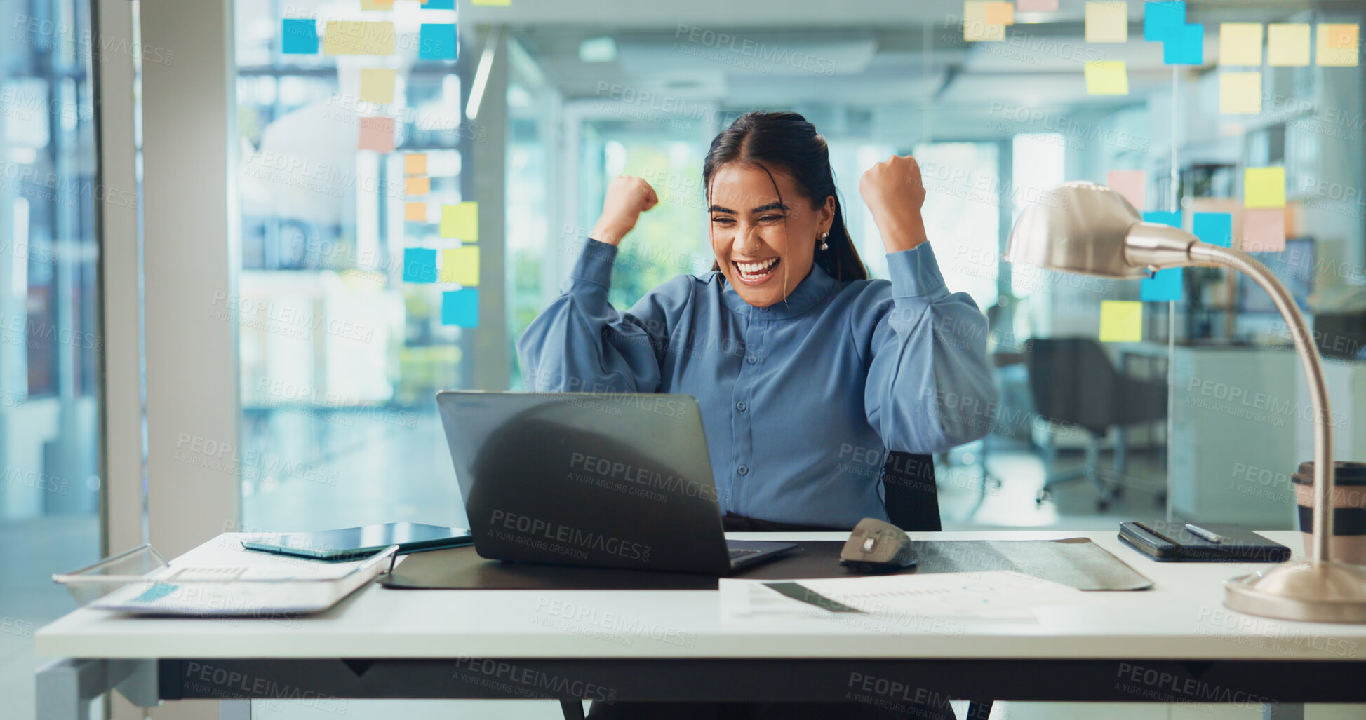 Buy stock photo Creative, woman and laptop with celebration at desk for campaign success, website launch or positive feedback. Digital marketer, employee and excited for company achievement, sale target or kpi goals