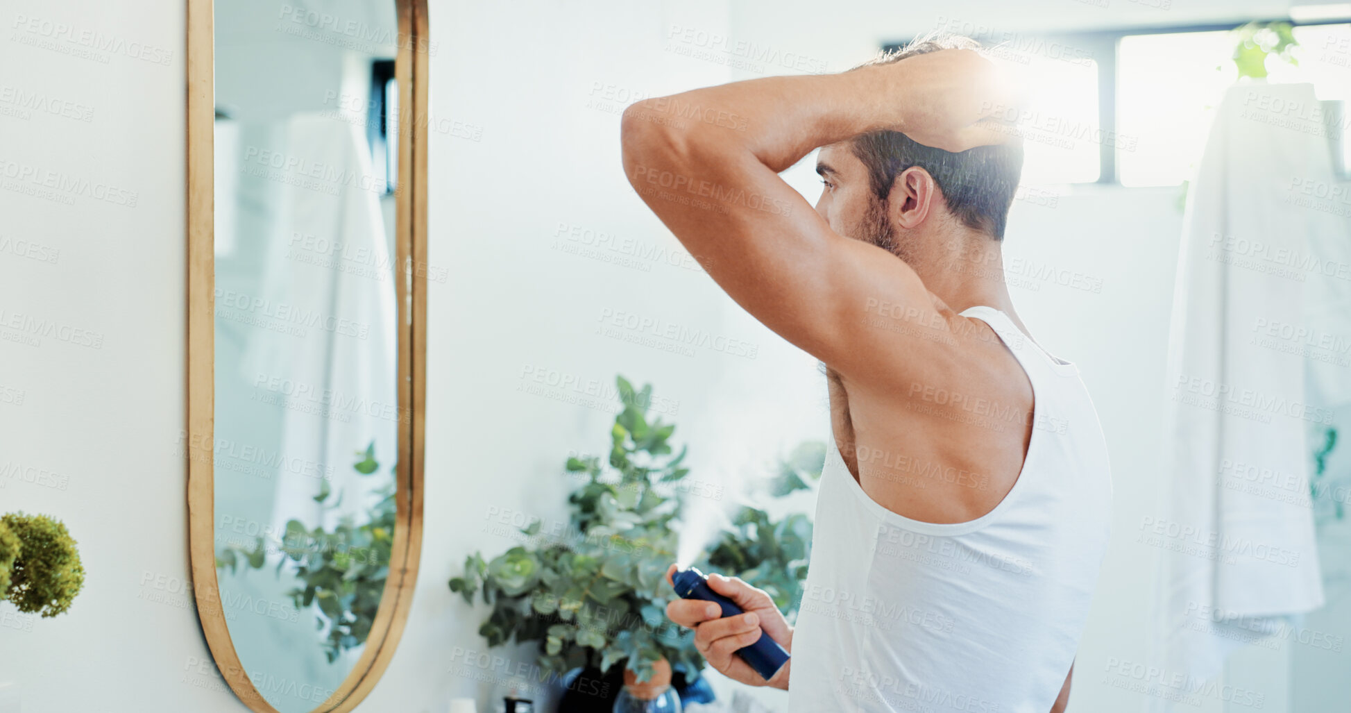 Buy stock photo Deodorant, mirror and spray with man in bathroom of home for hygiene or morning routine. Beauty, cologne fragrance and getting ready with person in apartment for aerosol can, skincare or fresh scent