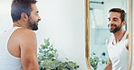 Beauty, cleaning and mirror with happy man in bathroom of home for hygiene or morning routine. Profile, satisfaction and skincare with person in apartment for checking, grooming or inspection