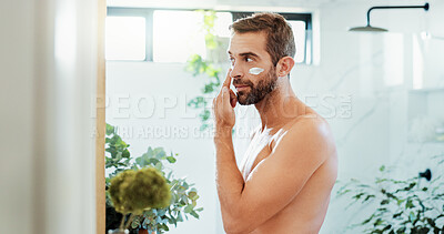Buy stock photo Man, skincare and face cream with moisturizer for grooming, facial treatment or skin protection at home. Male person, morning or routine with lotion, SPF or anti aging cosmetics for dermatology