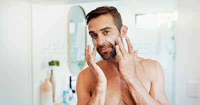 Buy stock photo Happy man, portrait or lotion with mirror for skincare, grooming or facial treatment at home. POV, male person or reflection with moisturizer, face cream or SPF for anti aging cosmetics in bathroom