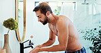 Man, mirror or tap with wash for hygiene, grooming or morning routine in bathroom at home. Male person, water and rinse with faucet or cleanliness for facial treatment, skincare or disinfect at house
