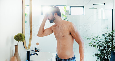 Buy stock photo Man, mirror and hair care for shower in bathroom for hairstyle, cleaning hygiene or grooming routine. Person, shirtless and reflection for beauty results, natural texture and scalp treatment at house