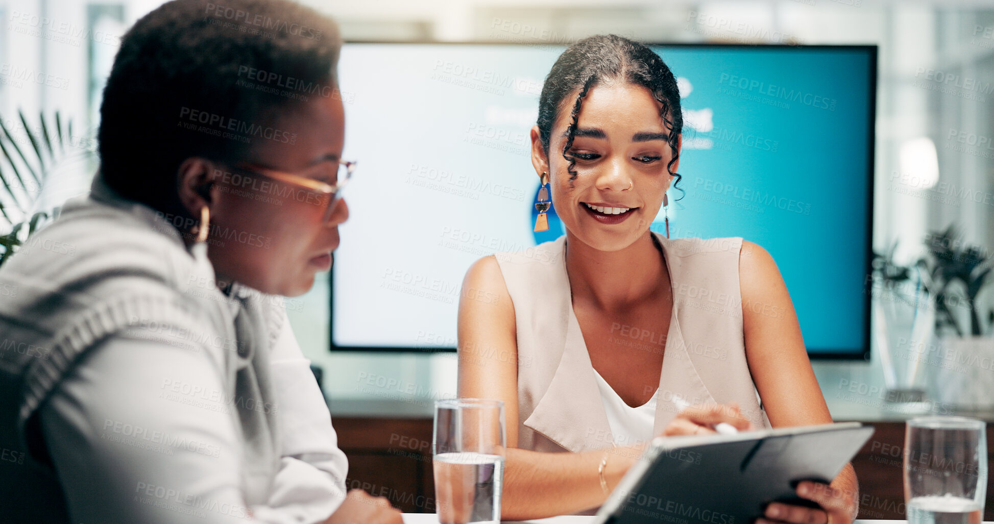 Buy stock photo Tablet, teamwork and business women with meeting, discussion and conversation in office for planning. Solution, brainstorming and group of employees for feedback report or digital project advice