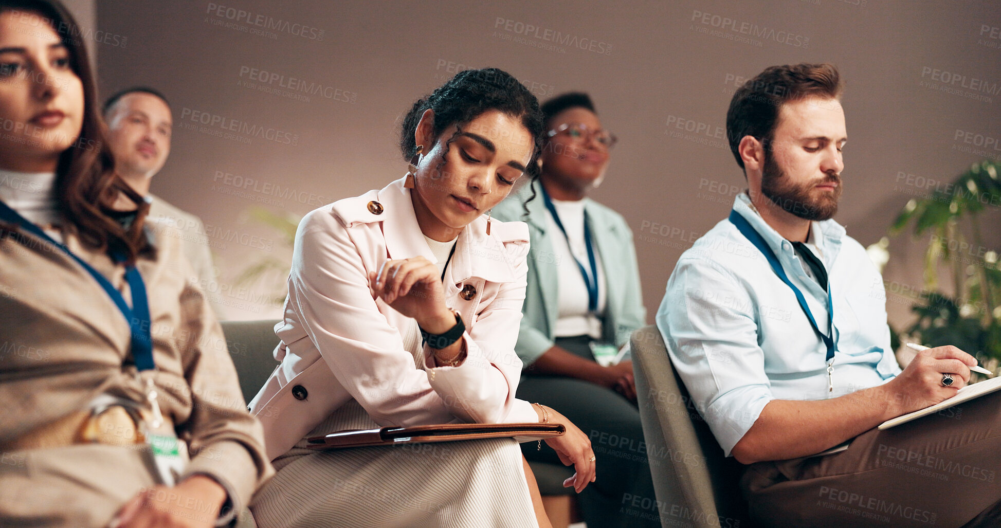 Buy stock photo Conference, bored and audience of business woman check time for presentation, seminar and convention. Professional, corporate and men and women with watch for meeting, training event and workshop