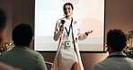 Business woman, conference and training for speaker in seminar room for wellness presentation. Education, forum speech and microphone with corporate coach on stage for public relations or development