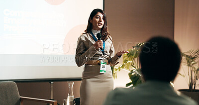 Buy stock photo Business woman, seminar and presentation for speaker in conference room for wellness training. Education, forum speech and microphone with corporate coach on stage for public relations or development