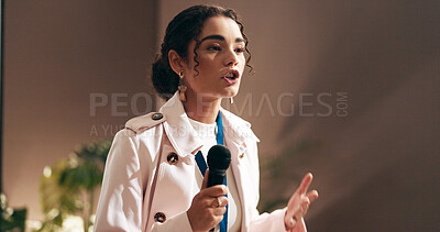 Buy stock photo Woman, presentation and talking at convention with microphone, speech and discussion at workshop. Person, public speaking and advocacy for staff wellness, stage and corporate seminar in auditorium