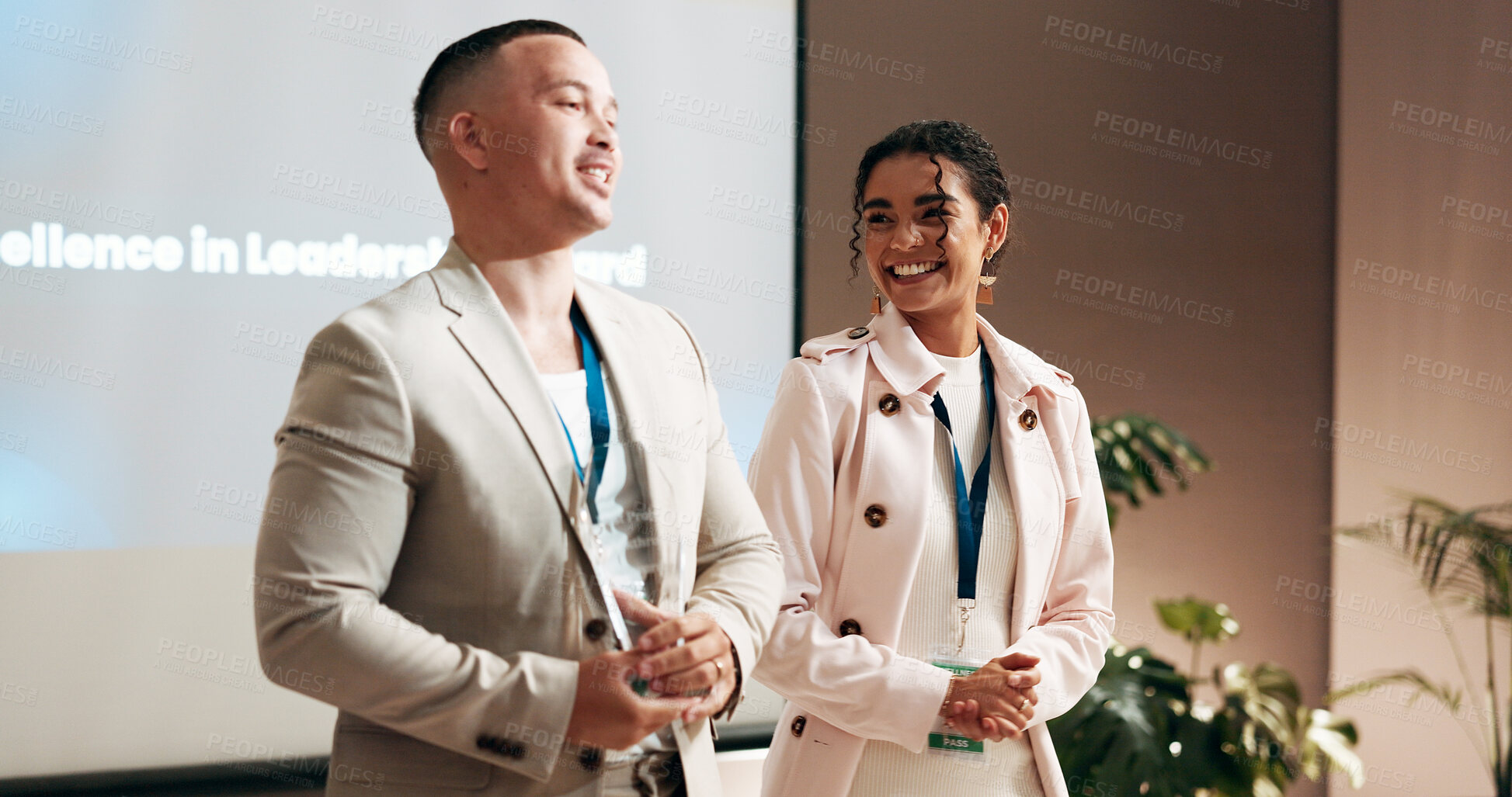 Buy stock photo Business, people and speaker with award at conference for corporate excellence, recognition and achievement. Global summit, employees and happy with trophy at event for sales performance and success