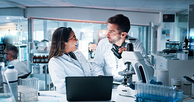 Buy stock photo Laptop, microscope and science with people in laboratory together for development. Computer, conversation and collaboration with medical team in clinical trial for reaction to surprise breakthrough
