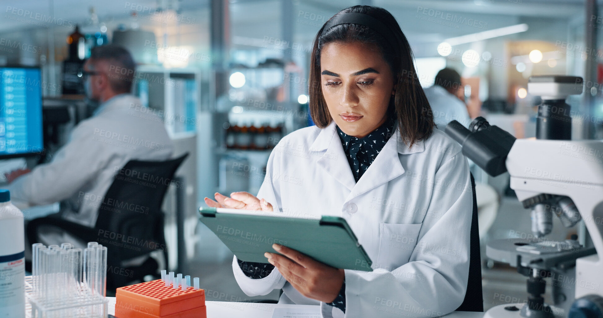 Buy stock photo Healthcare, tablet and research with woman in laboratory for DNA discovery, science or solution. Gene study, medical and clinical trial with scientist in clinic for microscope, results and biotech