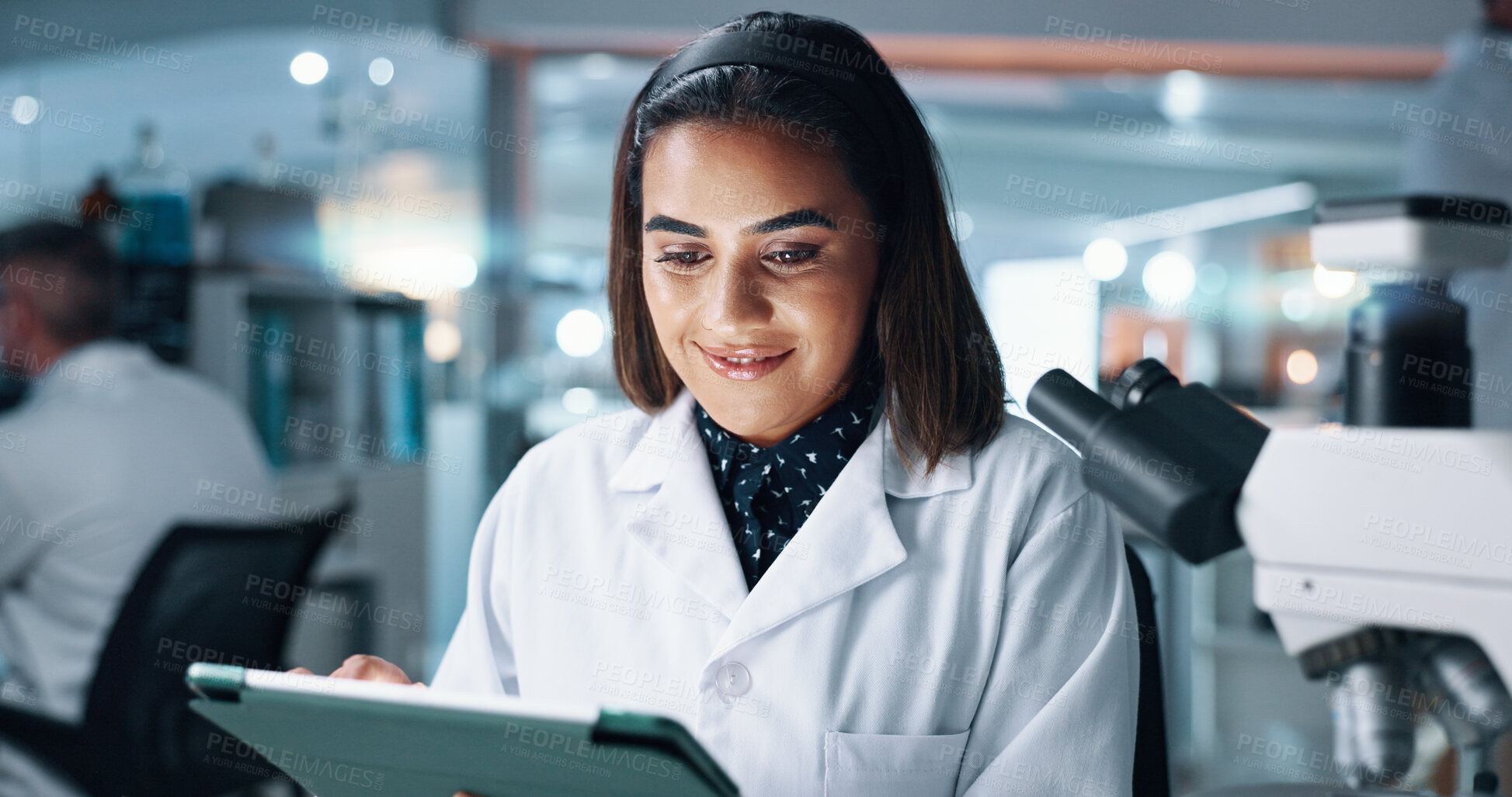 Buy stock photo Science, tablet and reading with woman in laboratory for DNA discovery, healthcare or research. Gene study, medical and clinical trial with scientist in clinic for microscope, results and biotech