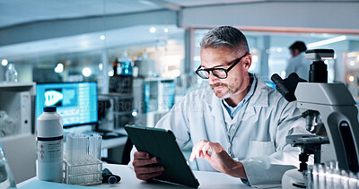 Buy stock photo Tablet, man and scientist in laboratory for medical research, experiment or study for innovation. Reading, glasses and mature male chemist with digital technology for online pharmaceutical report.