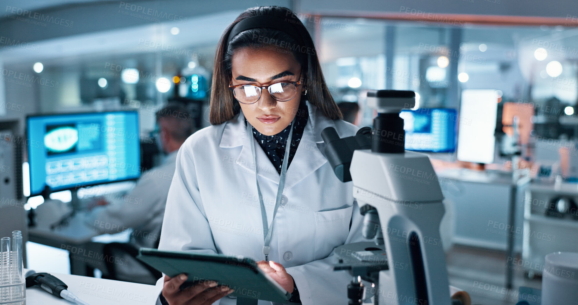 Buy stock photo Research, scientist and woman with tablet, microscope and test results with medical analysis, healthcare and cure. Person, experiment and researcher with tech, digital app and vaccine manufacturing