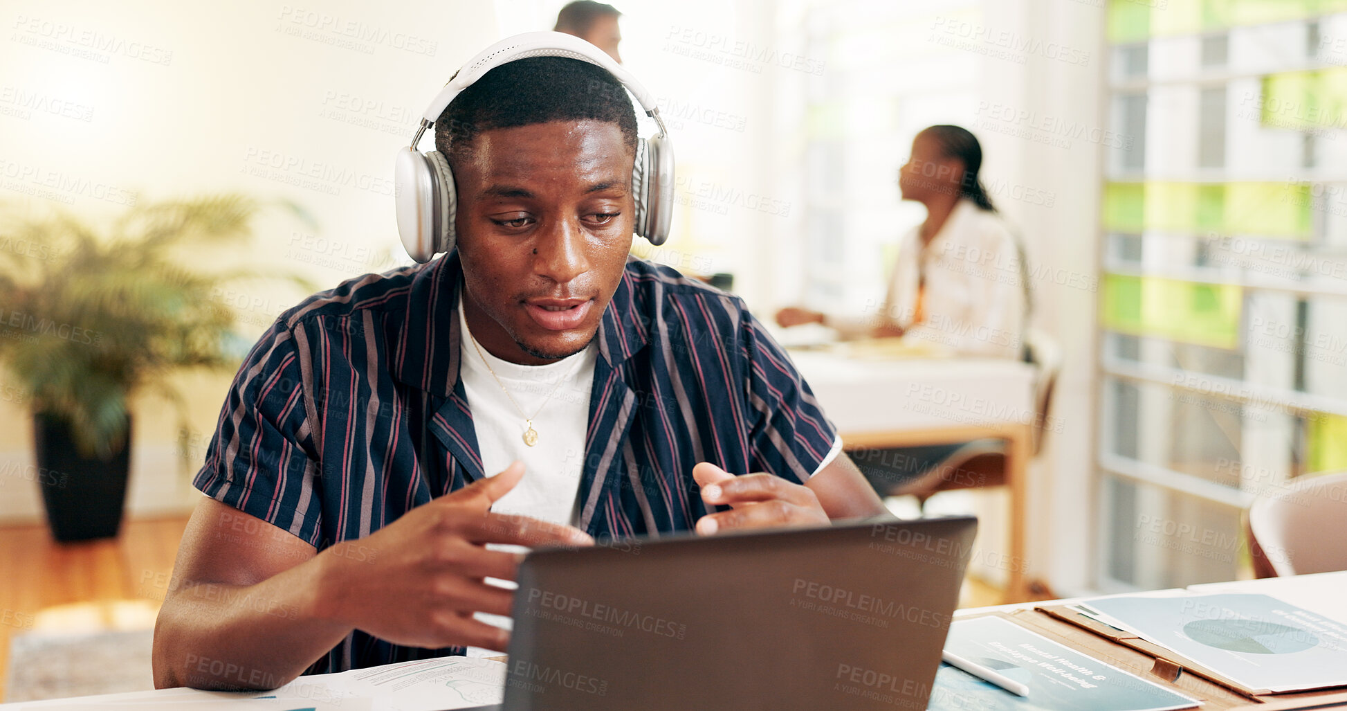 Buy stock photo Video call, student and man with laptop, university and exam in classroom with info and headphones. Learning, talking and people in college with tech, scholarship and communication for knowledge